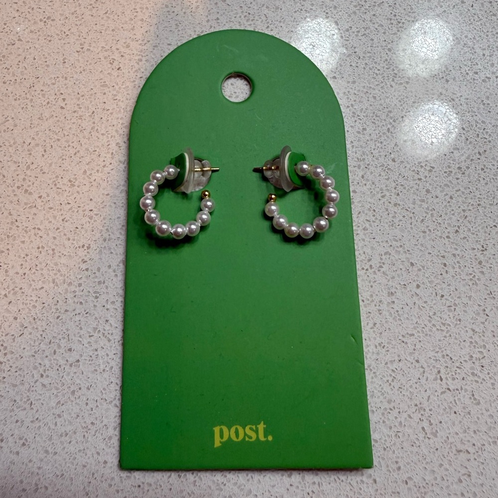 Elegant Gold Earrings by Post.